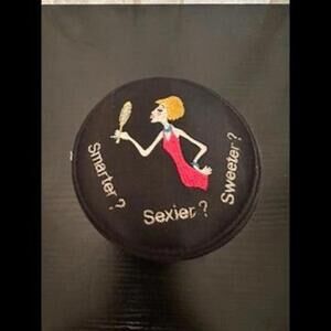 Whimsical Round Vanity Case with Embroidered Quip, ‘Smarter? Sexier? Sweeter?